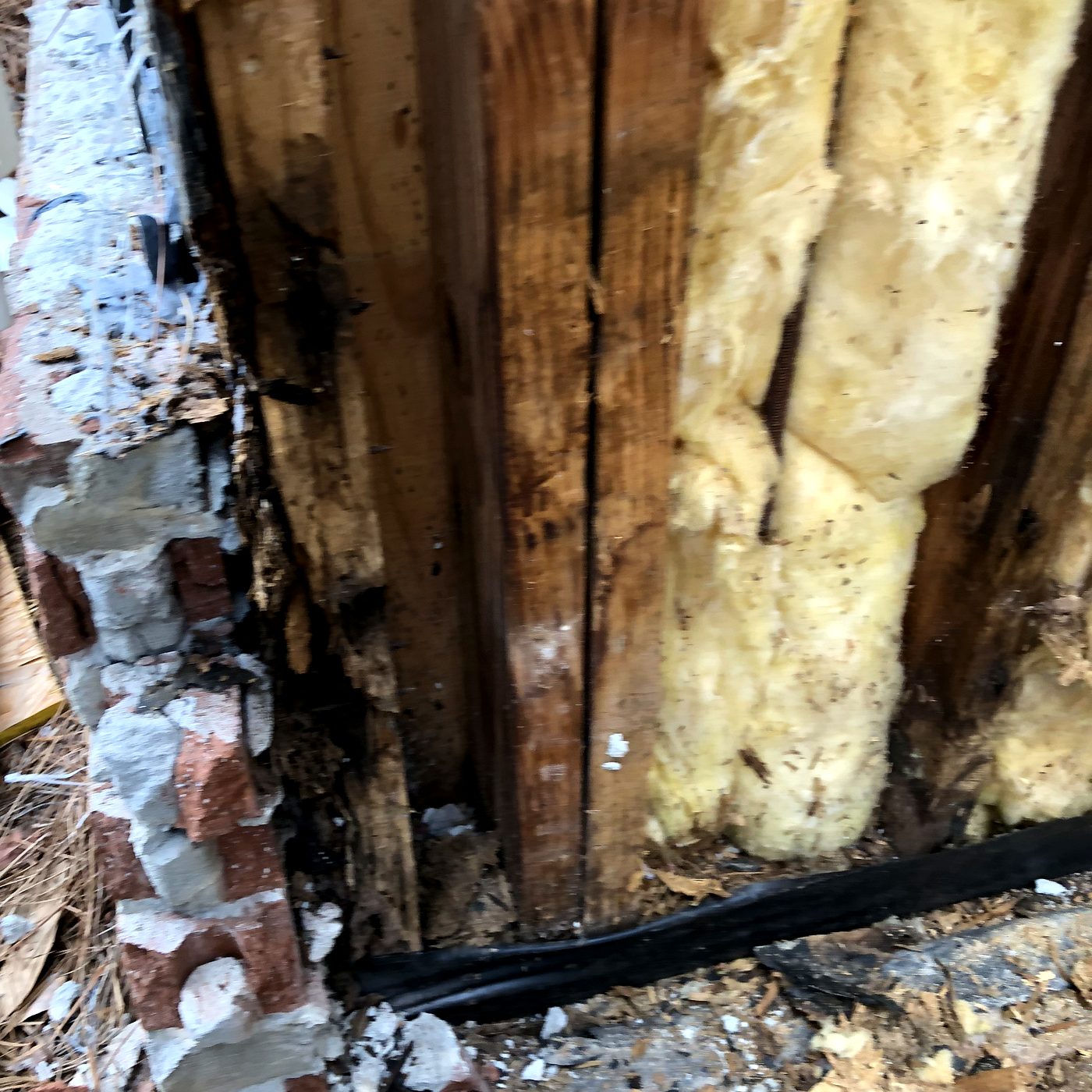 Window corner with rotted king stud framing on a coastal Florida home from improper window flashing